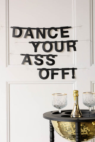 Image of the black alphabet garland with the phrase: 'dance your ass off'.