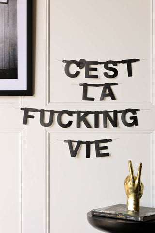 image of the black alphabet garland with the words: 'c'est la fucking vie'