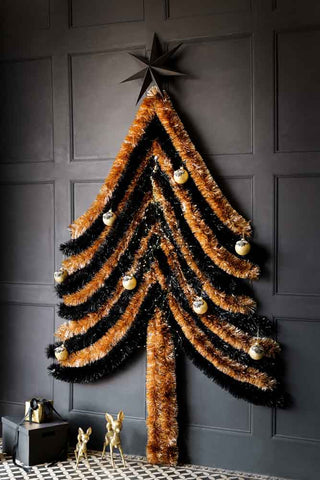 Image of the Eco-Friendly Recycled Metallic Gold Tinsel made into a Christmas tree with the Eco-Friendly Recycled Black Tinsel