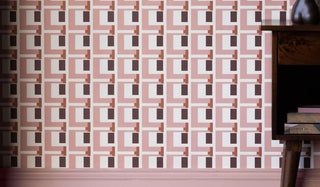 Close up image of Rockett St George Geometric peach wallpaper. 