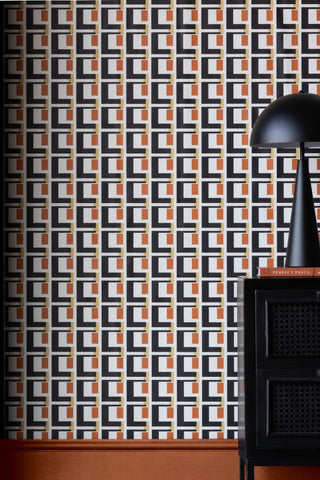 Lifestyle image of the Rockett St George Electric Geometric Rust Wallpaper