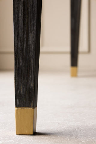 Image of the legs for the Elm & Brass Dining Table