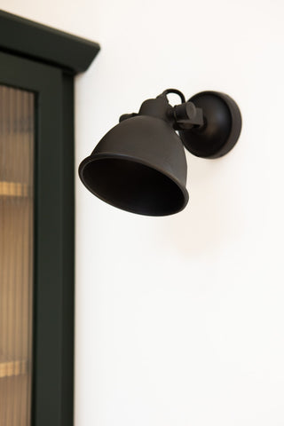Image of the Fabulous Wall Light - Black on a white wall