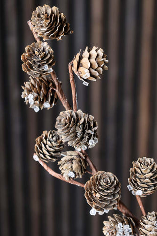 Close-up image of the Faux Pinecone Branch Stem