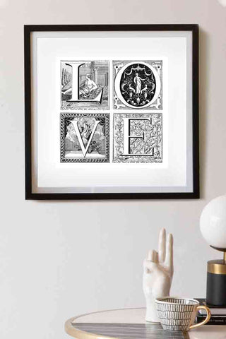 Lifestyle image of the LOVE Art Print in a black frame
