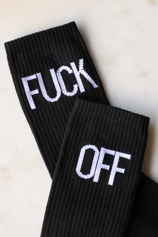 Close-up image of the Fuck Off Black Socks. 