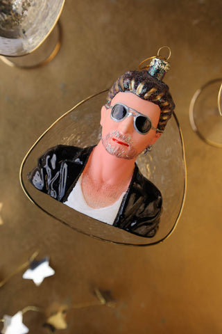 Image of the George Inspired Christmas Tree Decoration in a champagne glass.