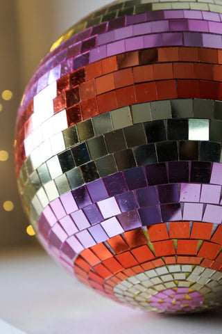 Close-up image of the Gold & Pink Stripy Disco Ball
