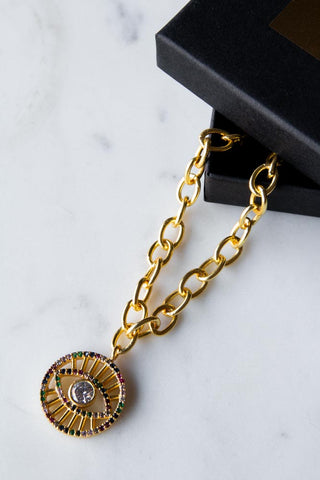 Image of the Gold Crystal Evil Eye Charm Bracelet with the gift box