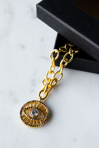 Lifestyle image of the Gold Crystal Evil Eye Charm Bracelet