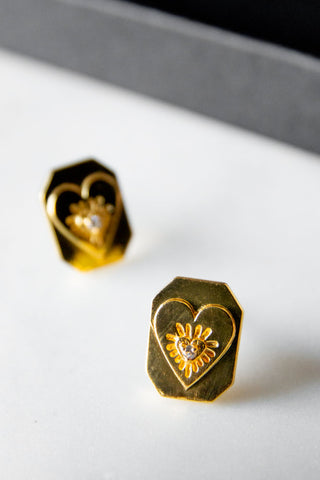 Lifestyle image of the Gold Crystal Heart Stud Earrings
