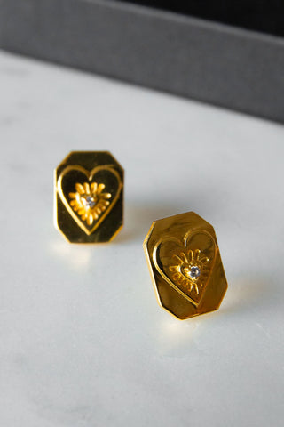 Close-up image of the Gold Crystal Heart Stud Earrings