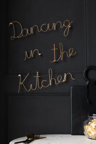 Image of the Gold Dancing In The Kitchen Sign