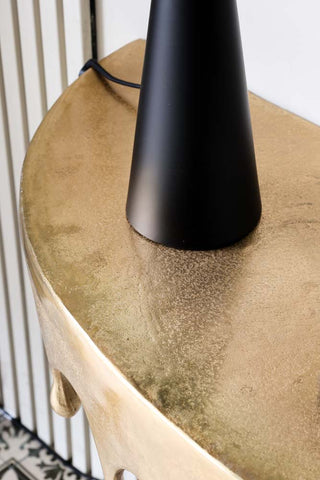 Close-up image of the Gold Drip Console Table