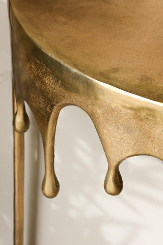 Image of the finish for the Gold Drip Console Table