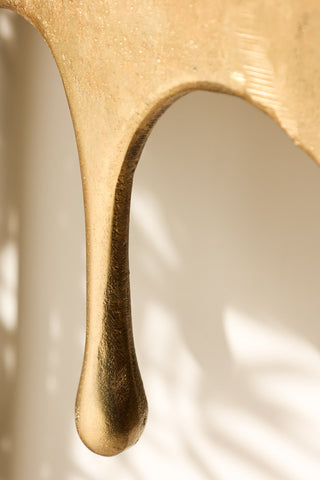 Detail image of the Gold Drip Console Table