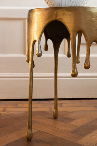 Close-up image of the drip detail on the Gold Drip Coffee Table
