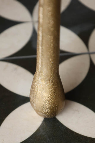 Detail image of the feet on the Gold Drip Coffee Table