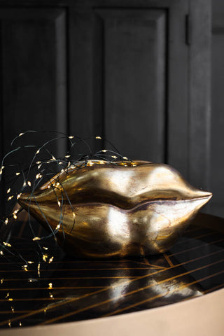 Image of the Gold Lips Short Stem Vase with fairy lights