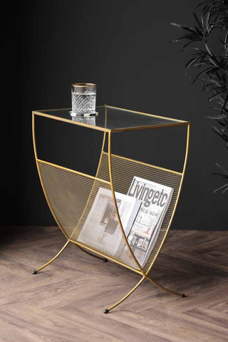 Lifestyle image of the Gold Magazine Rack With Glass Top