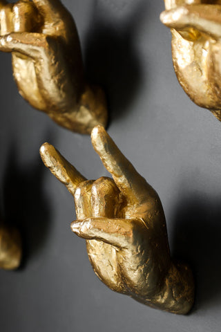 Close-up image of the Gold Set of 4 Rock On Wall Hands