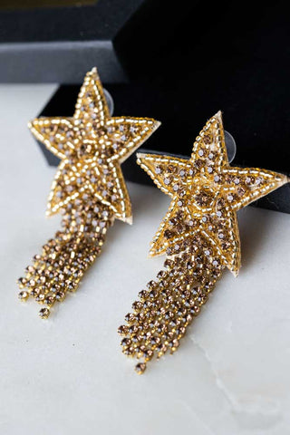 Lifestyle image of the Gold Shooting Star Beaded Earrings