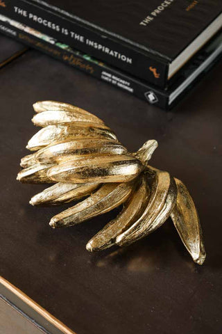 Lifestyle image of the Gold Bunch Of Bananas Ornament