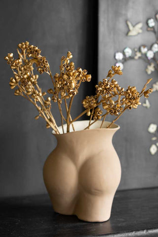 Close-up image of the Gorgeous Gold Dried Mini Seed Pods in a bum vase