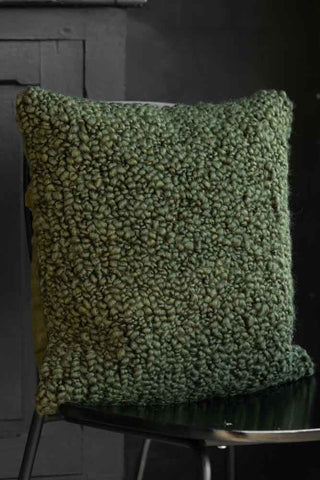 Lifestyle image of the Green Chunky Boucle Cushion