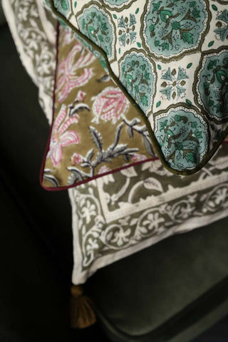 Close-up image of the corner of the Green Clover Block Printed Cushion