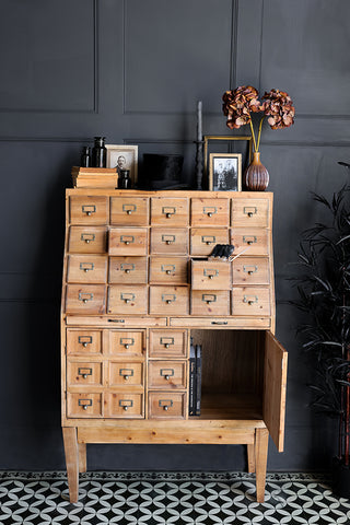 Lifestyle image of the Haberdashery Storage Cabinet with a door open