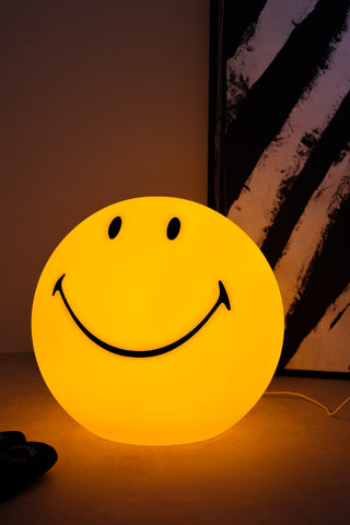 Image of the Smiley Floor Lamp lit up