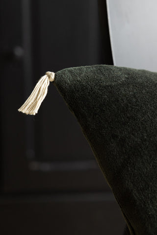 Image of the tassel for the Heart Velvet Cushion In Forest Green