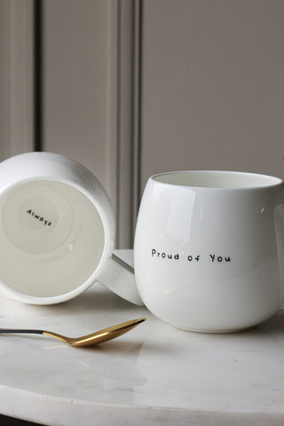 Close-up image showing the messages on the Hidden Message Proud Of You Mug