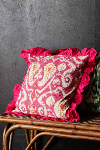 Lifestyle image of the Fuchsia Ikat & Frill Cotton Cushion