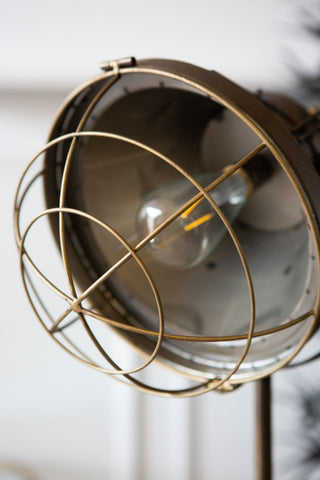 Image of the cage over the bulb on the Industrial-Style Battery Powered Tripod Floor Lamp