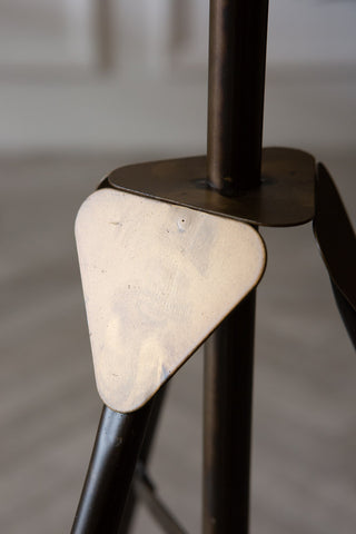 Image of the tripod base on the Industrial-Style Battery Powered Tripod Floor Lamp