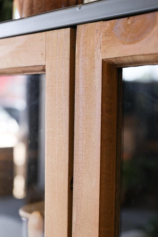 Detail image of the doors on the Industrial Style Wooden Display Cabinet On Wheels 