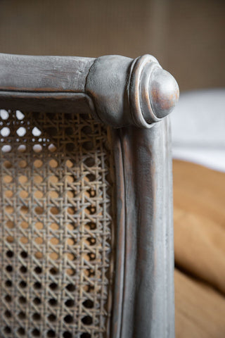 Close-up image of the roll-top detail on the King Size  Woven Cane Bed