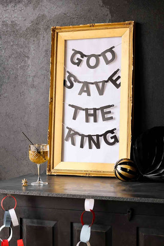 Image of the DIY Black Garland in a frame with the words - 'God Save The King'