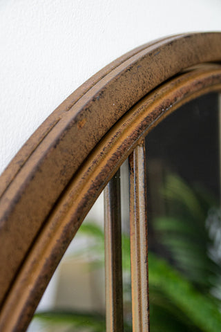 Close-up image of the top of the Large Antique Metal Window Mirror With Opening Doors