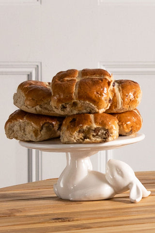 Image of the Lazy Rabbit Cake Plate with six hot cross buns stacked on the plate
