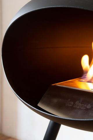 Close-up image of the Le Feu Ground Wood Eco Fireplace lit