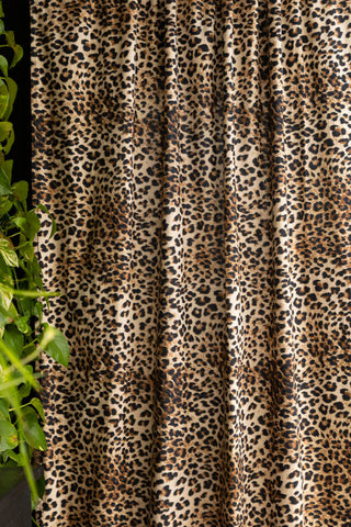 Close-up image of the Set Of 2 Leopard Print Cotton Curtains