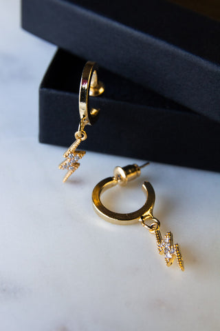 Image of the Lightning Bolt Gold Huggie Earrings