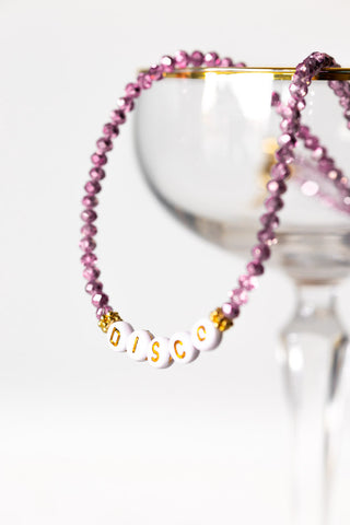 Close-up image of the Lilac Disco Necklace