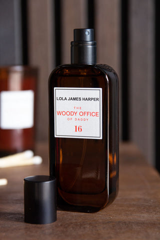 Image of the Lola James Harper Woody Office Room Spray with the lid off
