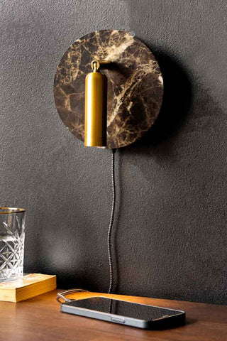 Angled image of the Brown Marble Effect Light With USB phone charger plugged in