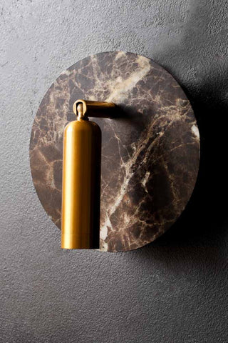 Lifestyle image of the Brown Marble Effect Light With USB phone charger on the wall
