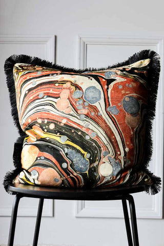 Lifestyle image of the Marble Velvet Fringed Cushion